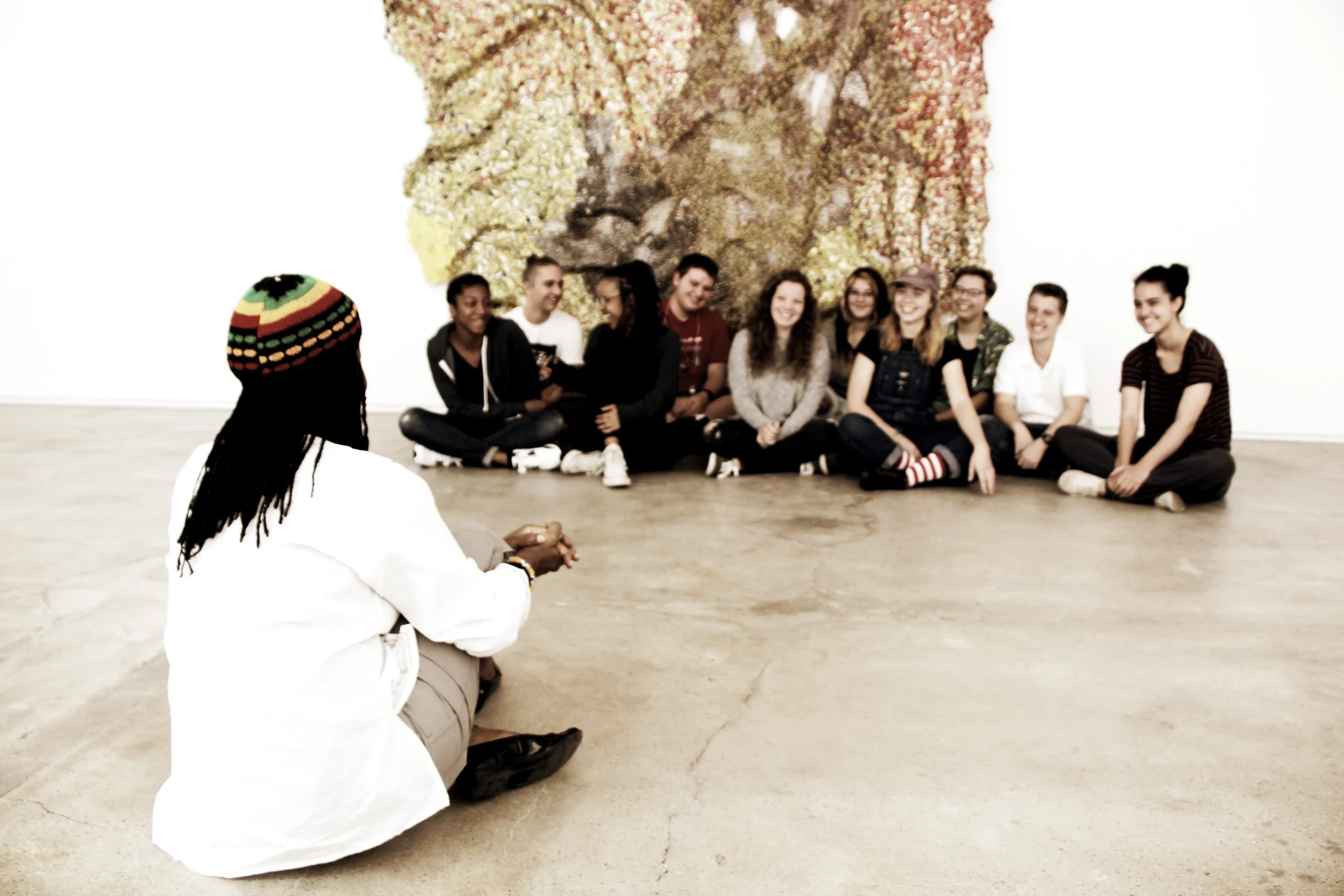 Producer Oyiza Adaba Interviews Students At The School.