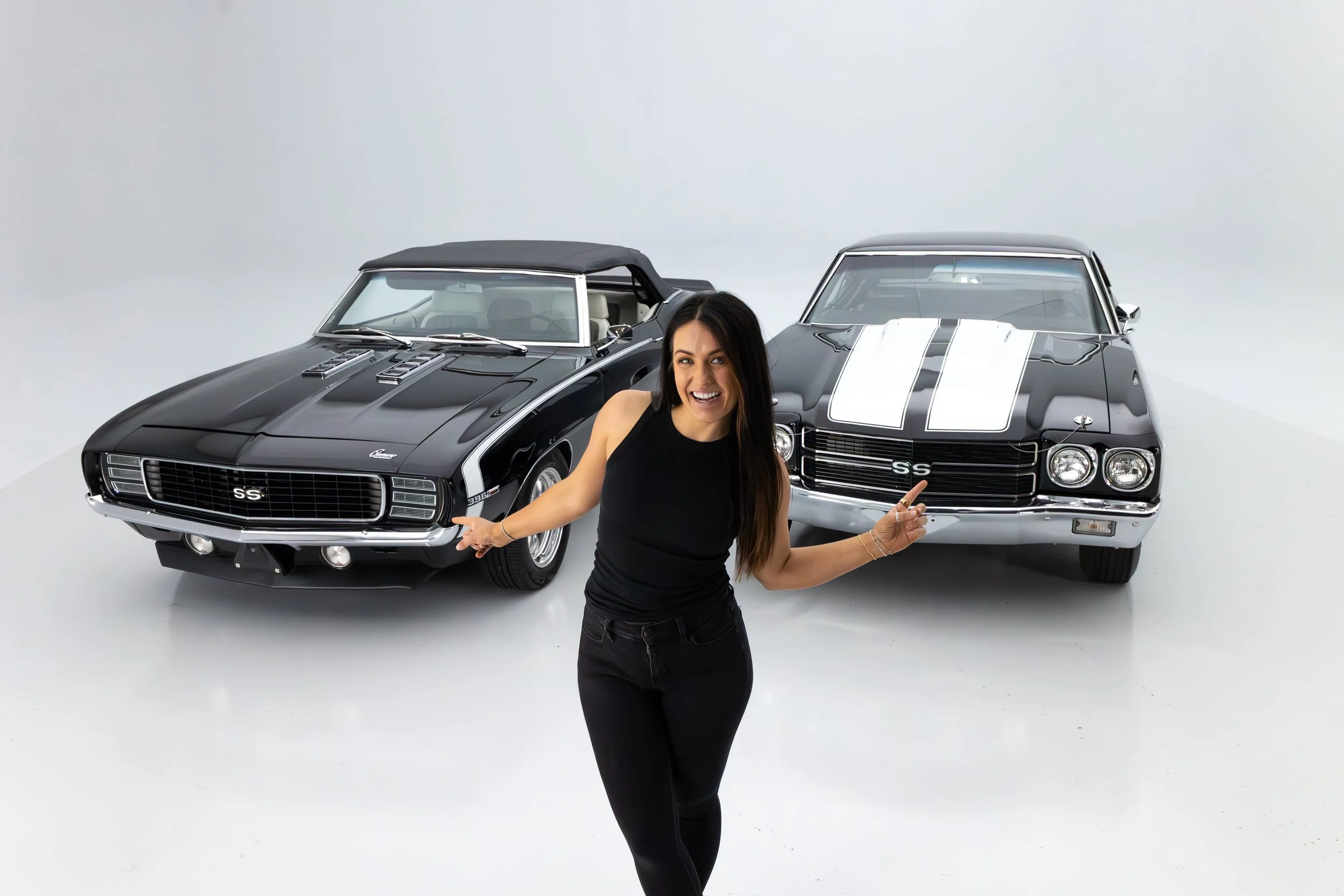 Alex Taylor Standing with the cars from Dream Giveaway's 2025 Super Chevy Giveaway