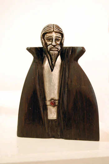 Old Wizard: Silver w/Blue Sapphires and Garnet, 5.5 in; on Black Oak.