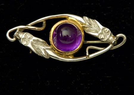 2 dragon platinum brooch, w. amethyst