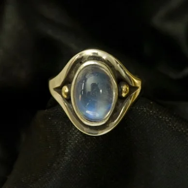 Ring: Blue Moonstone, 13x9 mm; Silver w/18kt Gold.