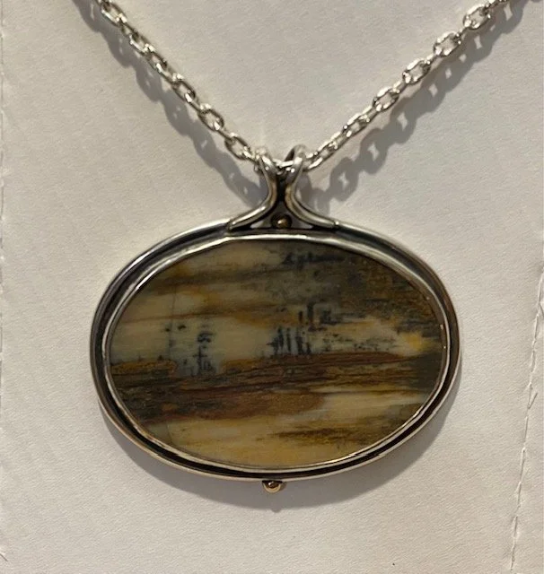Silver pendant w. agate ( Turner inspired) silver w. gold ornaments.