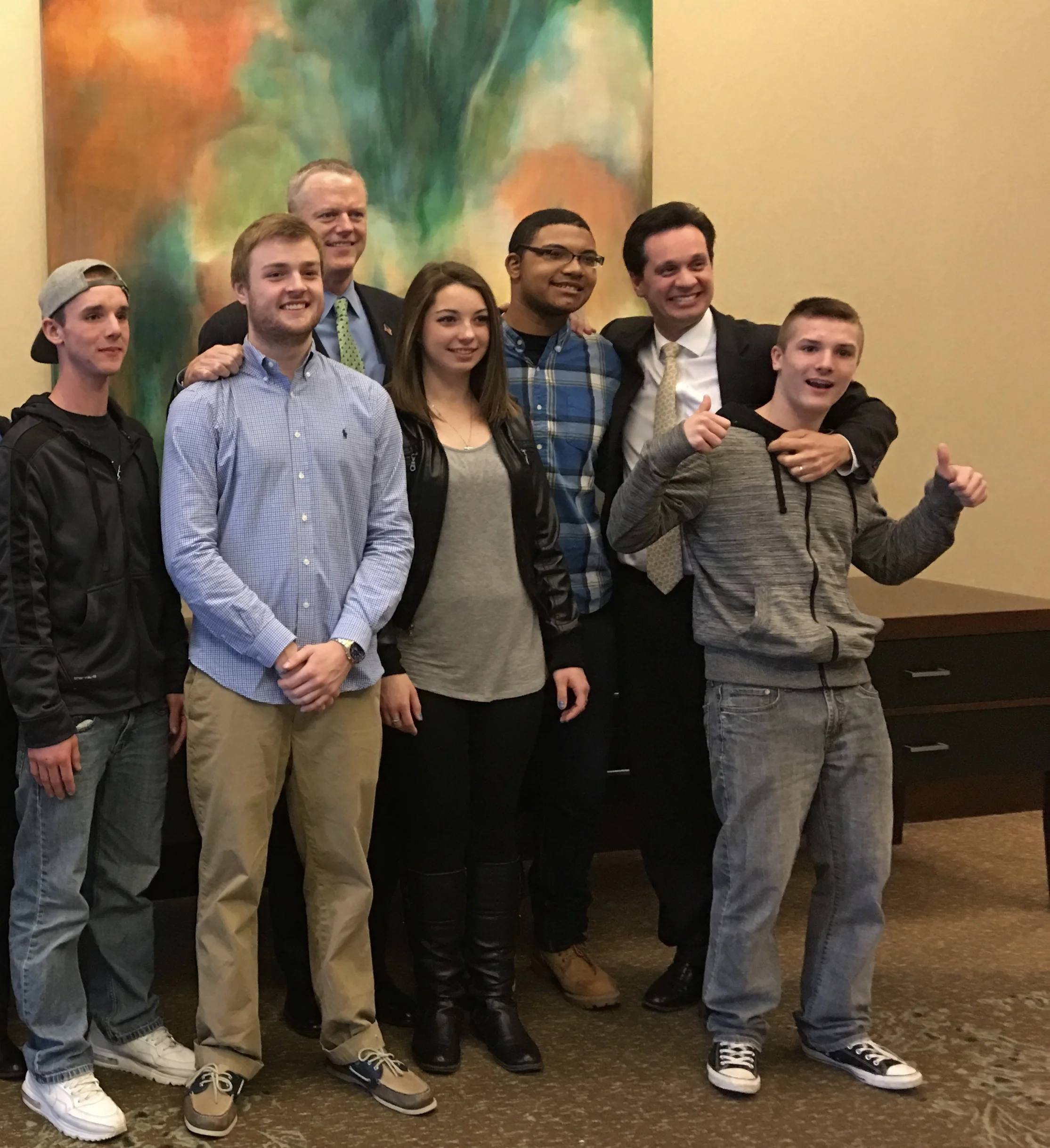 The original cast of The Price You Pay at the Statehouse with Governor Charlie Baker and State Senator Vinny deMacedo