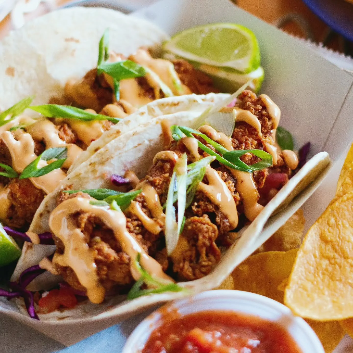 We put honey habanero fried chicken in a taco. Add in some red cabbage + lime slaw, pickled onion, pico &amp; chipotle crema. Trust us. 🌶️

See you tonight for dinner, followed by Tatas + Tacos drag show at 8pm, come early to grab a spot!
