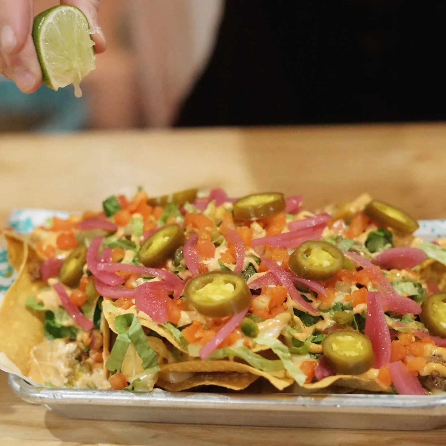 If you haven't stopped in for Happy Hour lately... this snack size portion of our Nachos Supreme might convince you. Pair with a $7 mule or spicy paloma and start the holiday weekend ✨️
