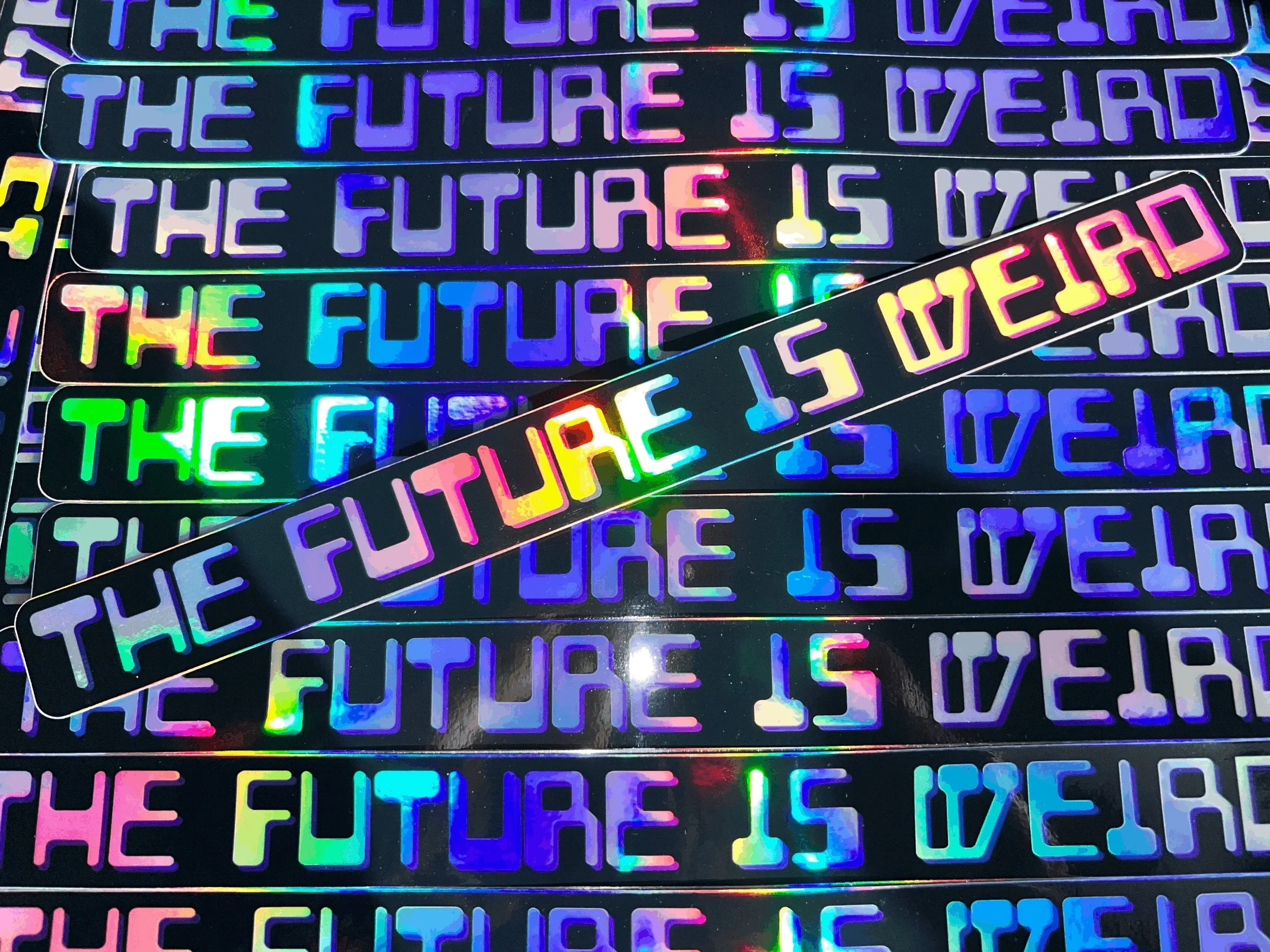 HOLOGRAPHIC THE FUTURE IS WEIRD STICKER
