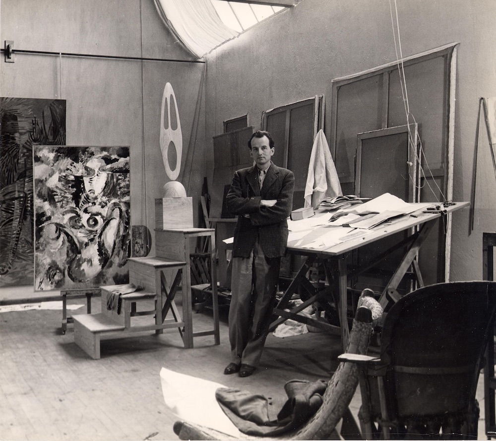 Wolfgang Paaren in front of Les Premieres Spaciales in his studio in San Angel, Mexico, 1944, photographer: Walter Reuter