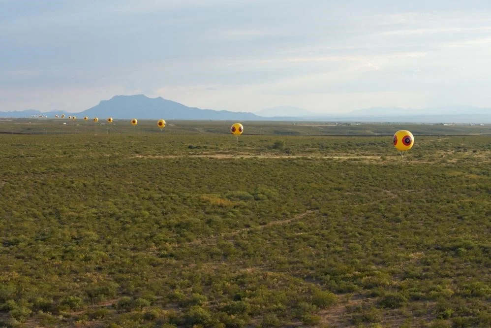 Postcommodity, Repellent Fence, Inflatable Balloons, 10'x10' each, Variable installation dimensions, 2015. Courtesy of the artists