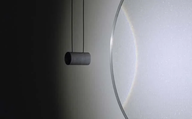 Detail of Chris Fraser’s “EMMANUELLE” (2013), Glass Microspheres, Plate Glass, Aluminum, LED Pendant, 24 1/4″ Diameter x 1″