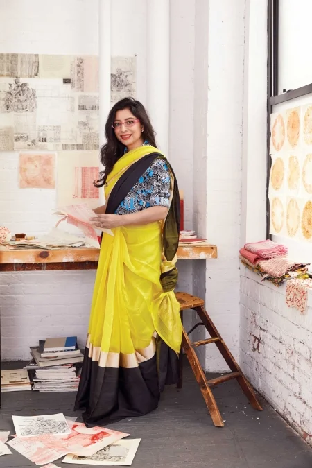 NANDINI CHIRIMAR. Cotton shirt, Michael Kors Collection. Silk sari, Raw Mango. Acetate glasses, metal ring; both Chirimar’s own