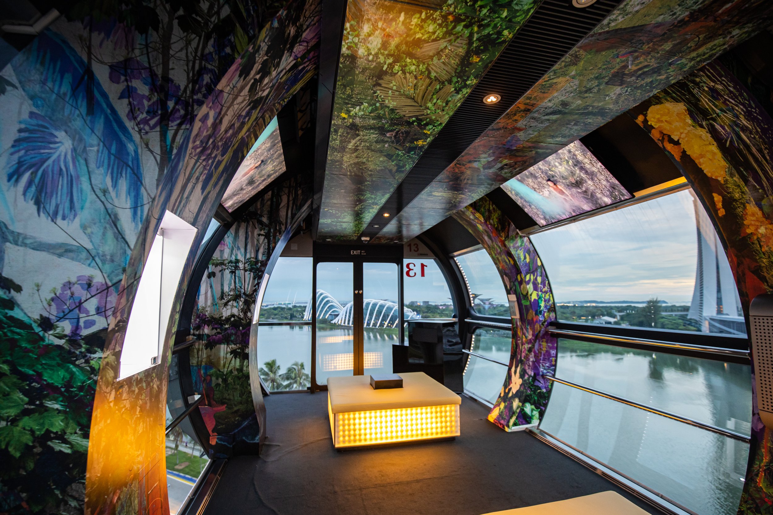  Ranu Mukherjee,  Ensemble for Non-Linear Time , film and vinyl installation in a capsule on the Singapore Flyer, Singapore Biennale: Natasha, 2022. Image Courtesy of Singapore Art Museum. 