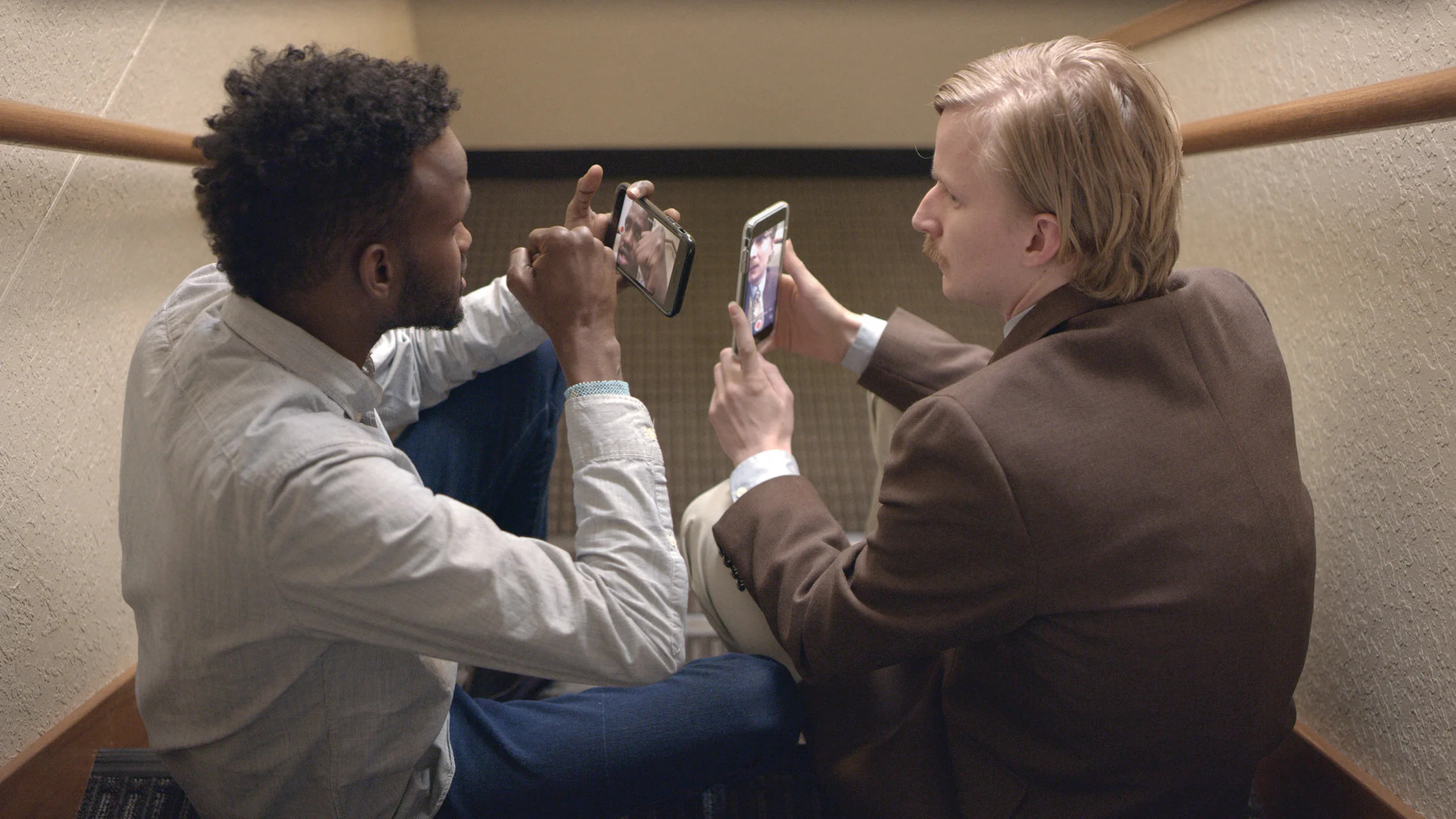 Barkhad Abdirahman as “Isma’il” and Mikey Johnson as “Vernell”