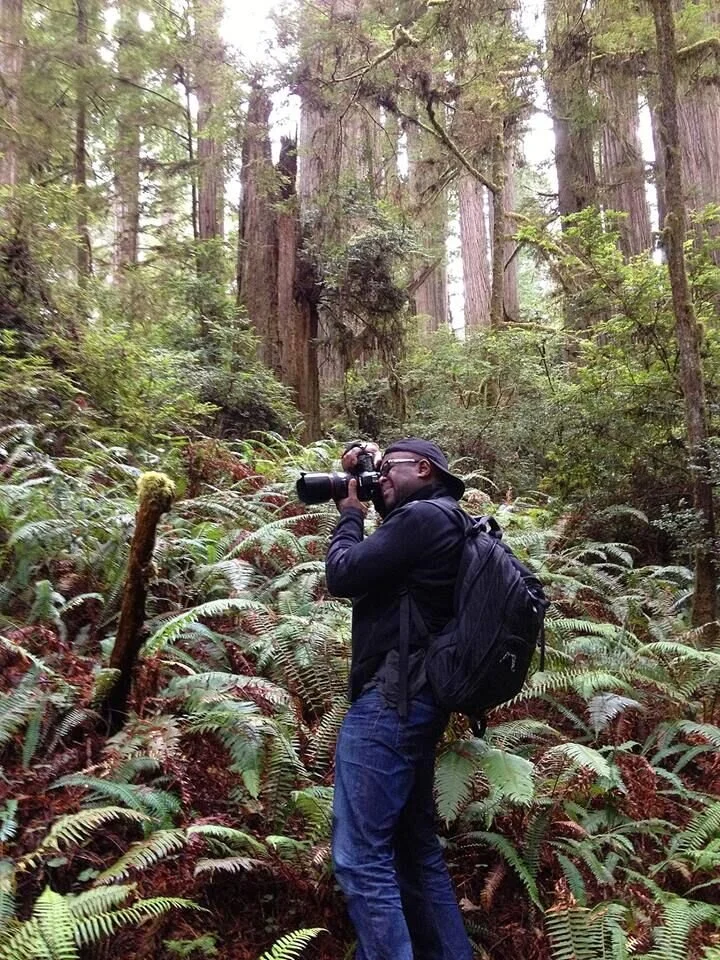Samite Photographing in Forest (1).jpeg