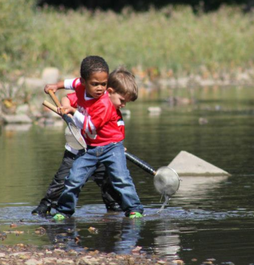 Meno. River Kids Pic_boy in river.png