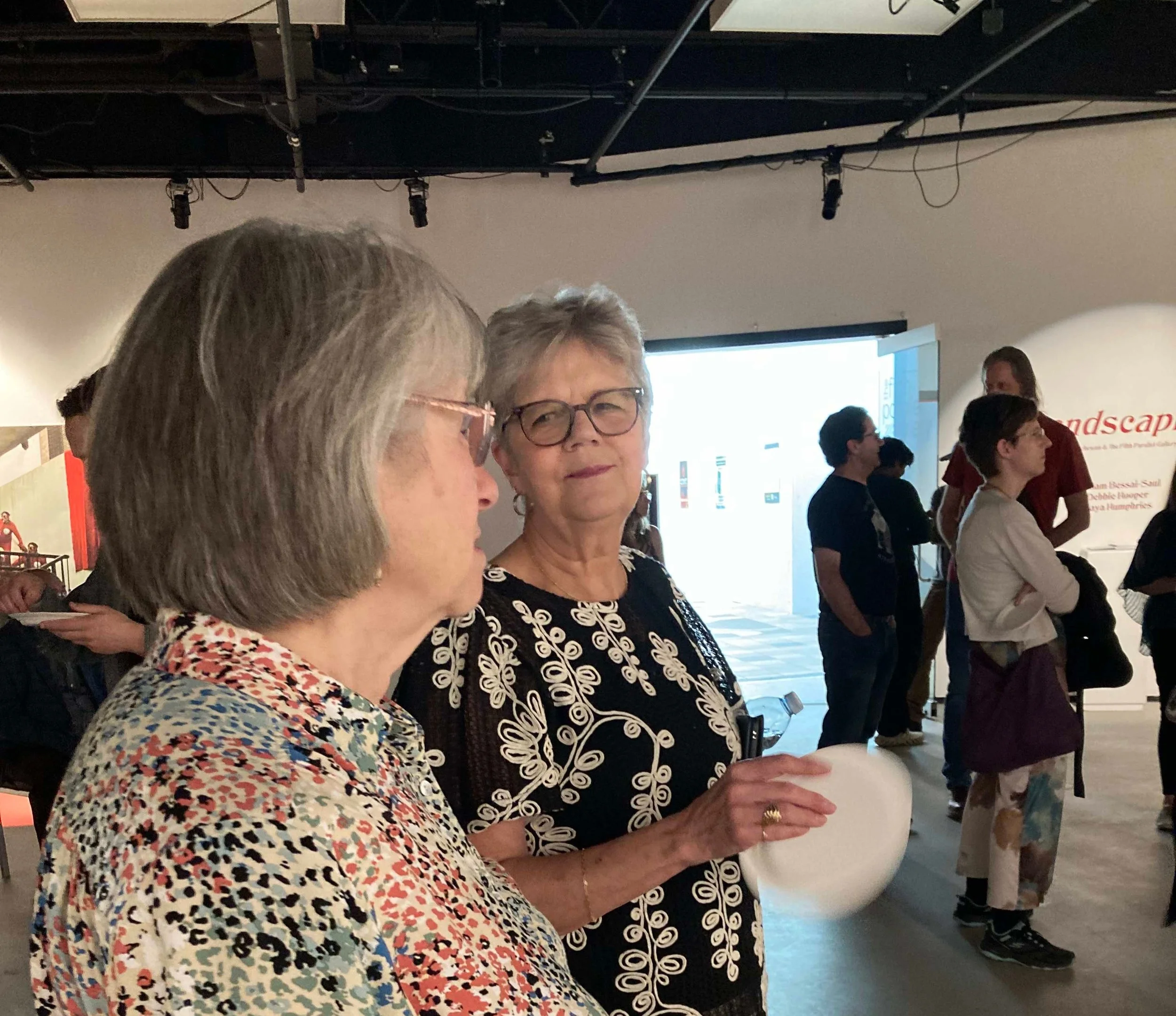 Artist Debbie Hooper with guest at the LANDSCAPING Reception