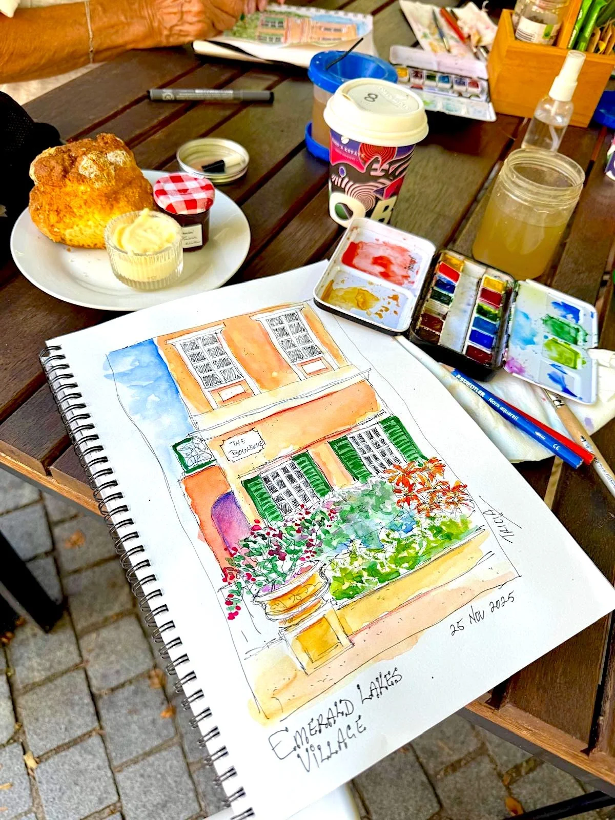 Tricia Cafe Sketching.JPG