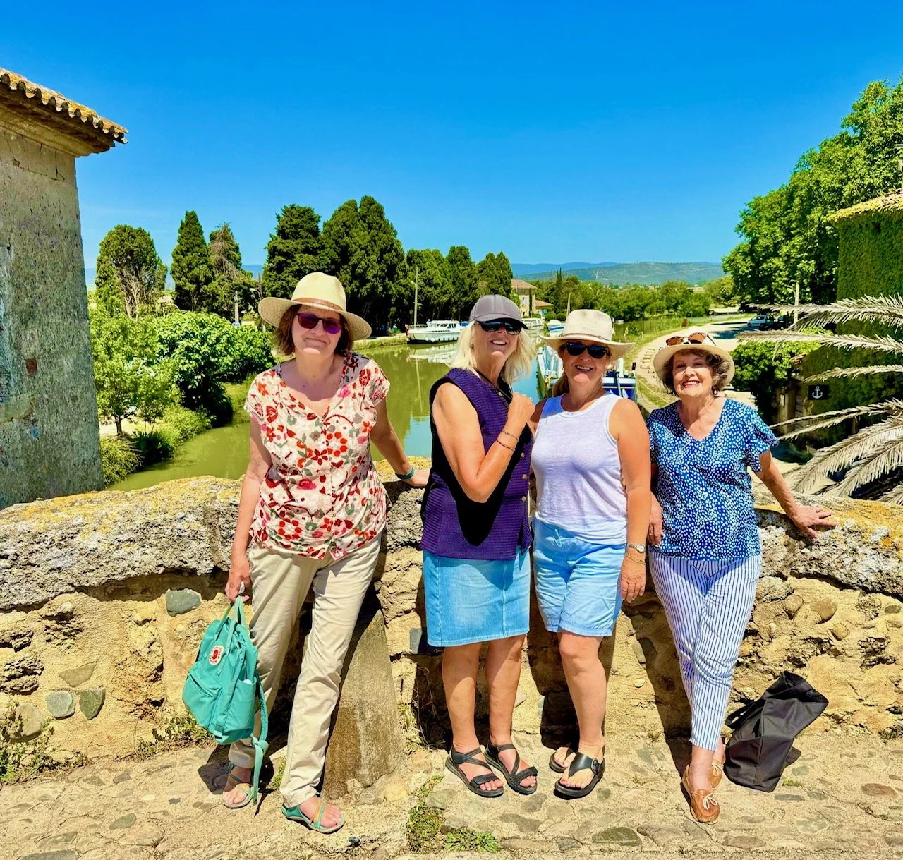 4 of us on the Le Somail bridge.jpg