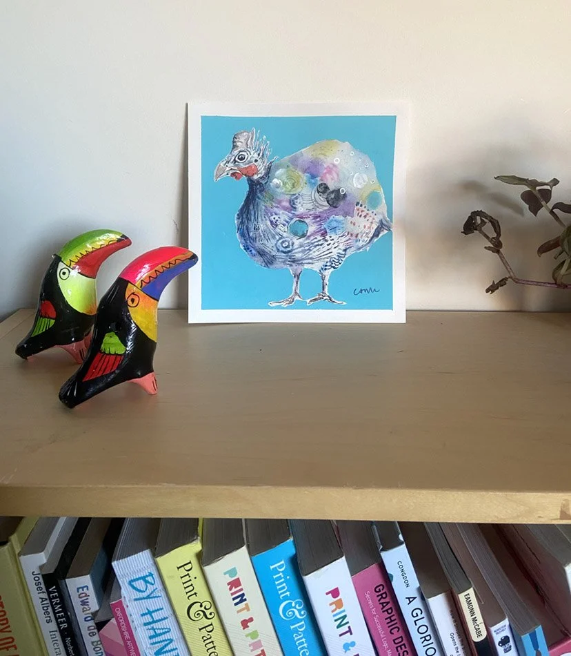 A Little Bit Dotty, colourful original guinea fowl artwork by Catherine Jennifer, displayed on a shelf.