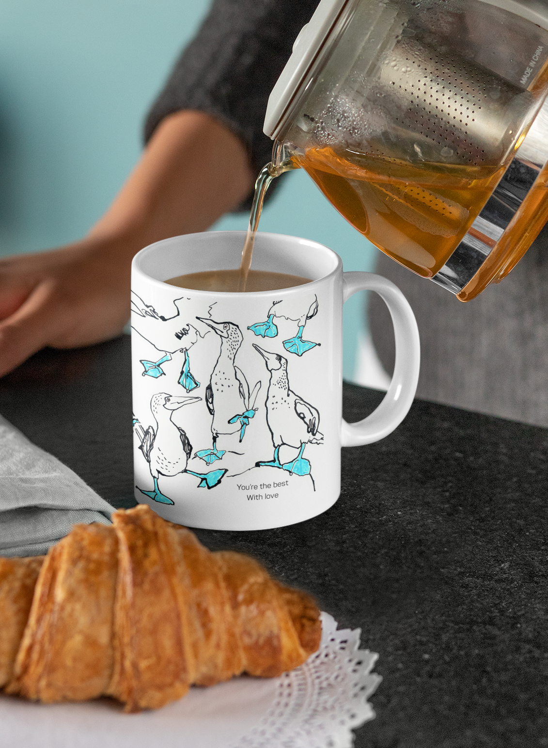 Designer mug featuring ink drawings by artist Catherine Jennifer. Will light up your coffee experience. For bird lovers and art lovers!