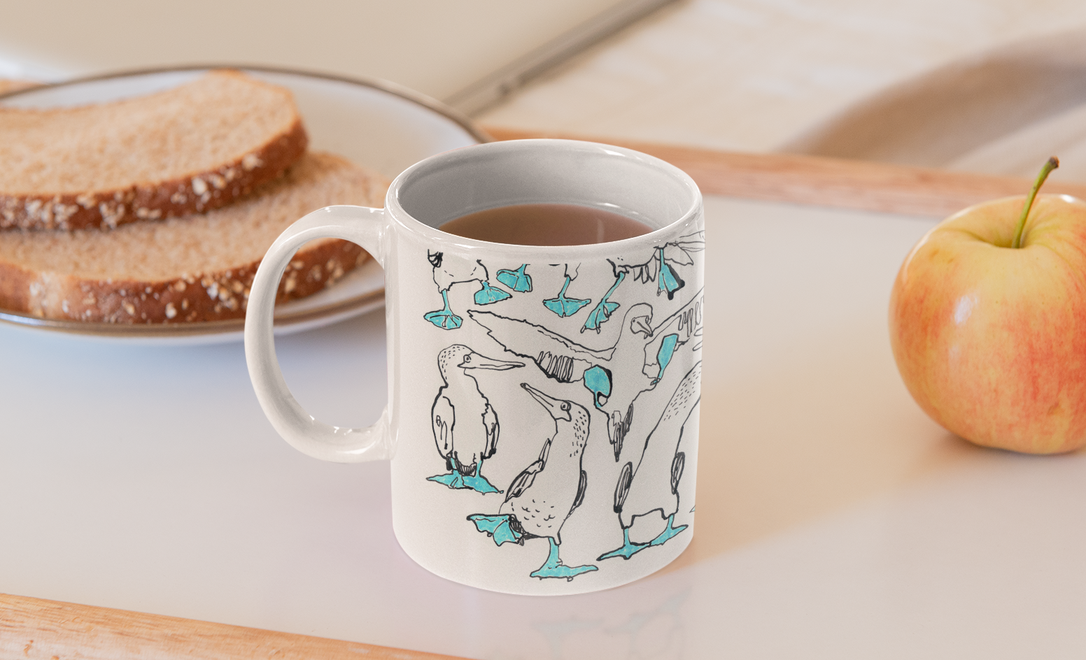 Designer mug featuring ink drawings by artist Catherine Jennifer. Will light up your coffee experience. For bird lovers and art lovers!