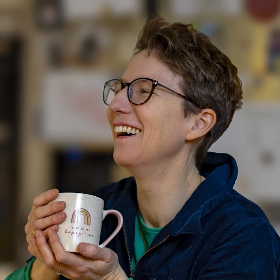 Cath-headshot-with-coffee.jpg