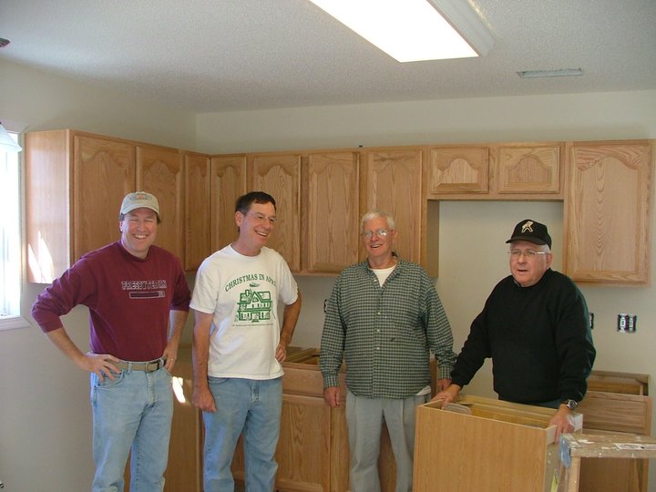 4-workers-w-cabinets.jpg