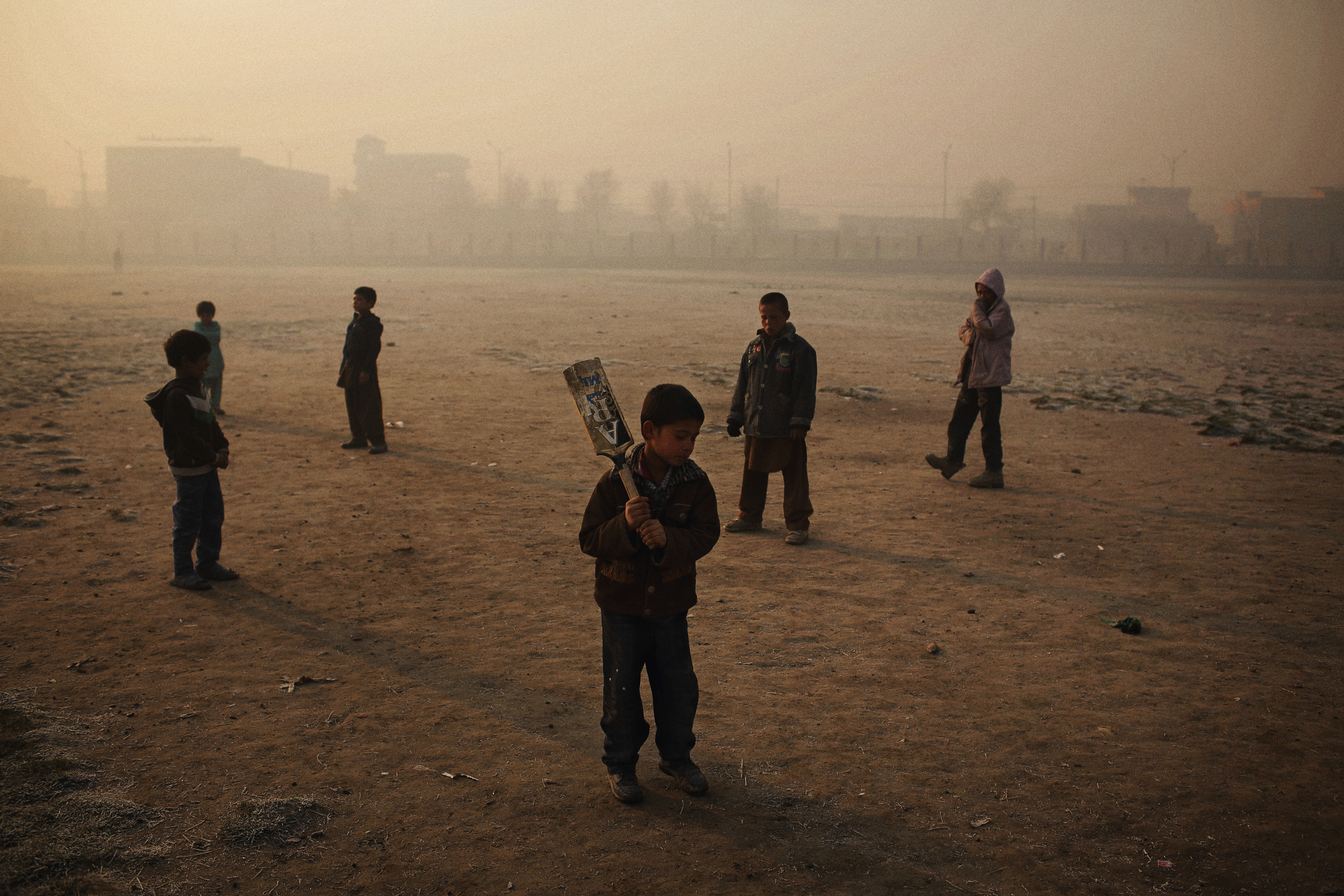  At sunrise, young cricketers play on a field adjacent to the country’s national stadium. The sport became wildly popular in Afghanistan after the 5 million-odd Afghans who’d sought refuge in Pakistan through decades of war returned after 2001. Kabul