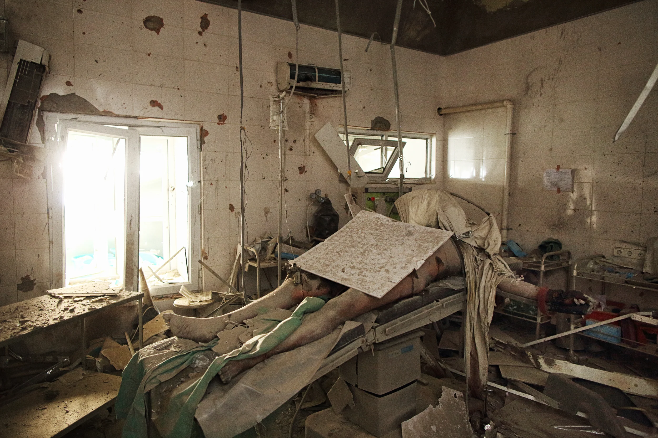  A patient of Médecines Sans Frontières’ Kunduz Trauma Centre, later identified as 43-year-old husband and father of four, Baynazar Mohammad Nazar, lays dead a week after an American AC-130 gunship destroyed the hospital, mistaking it for a Taliban c