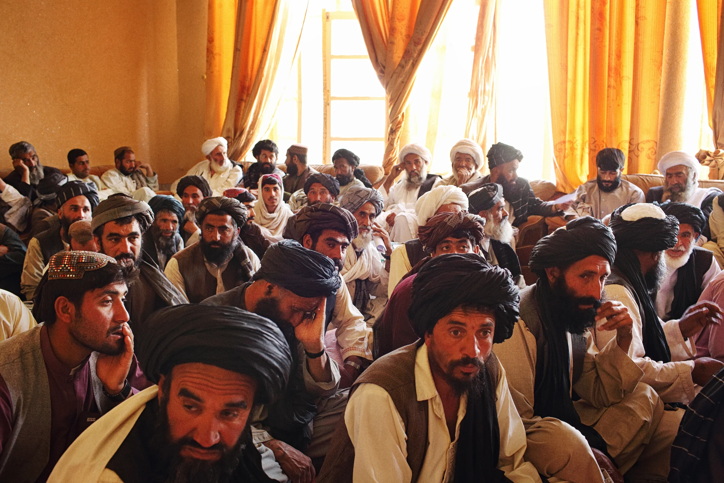  Elders from across Helmand gather to air grievances over water distribution and security before then Provincial Governor Mangal in the Bost Hotel. Helmand Province, April, 2015. 
