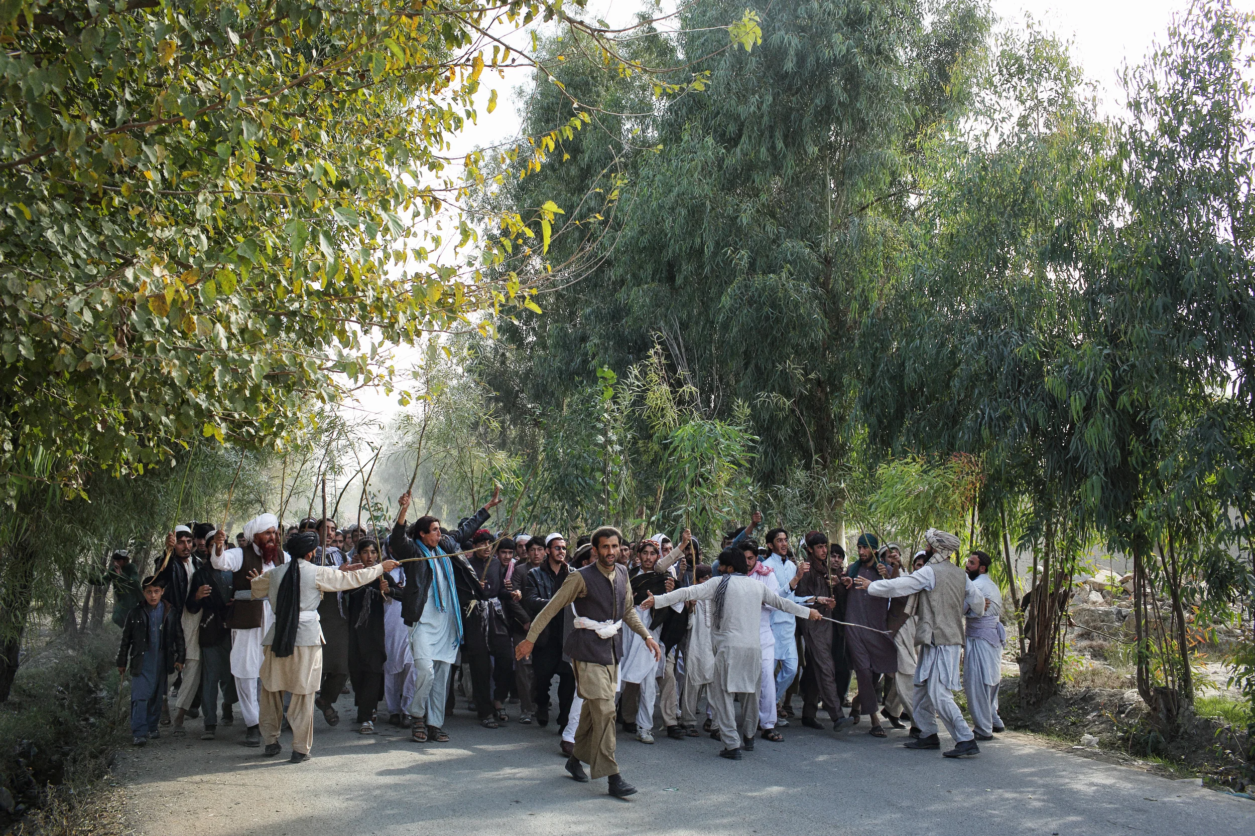  After two men were killed by the secretive, CIA-trained Khost Protection Force during a night-raid the night before, men from the village protested against the deaths in a procession, carrying the bodies of the men and, in a show of abject dissatisf