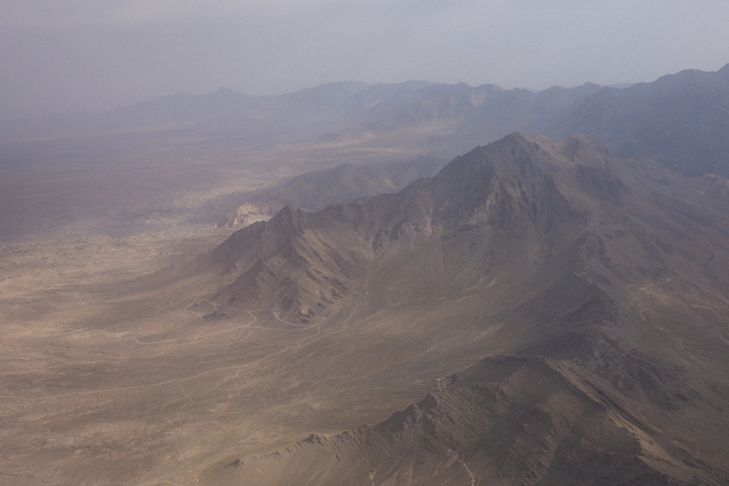  The Hindu Kush Mountains rise from the northern edge of the Kabul basin. Kabul, August, 2016. 