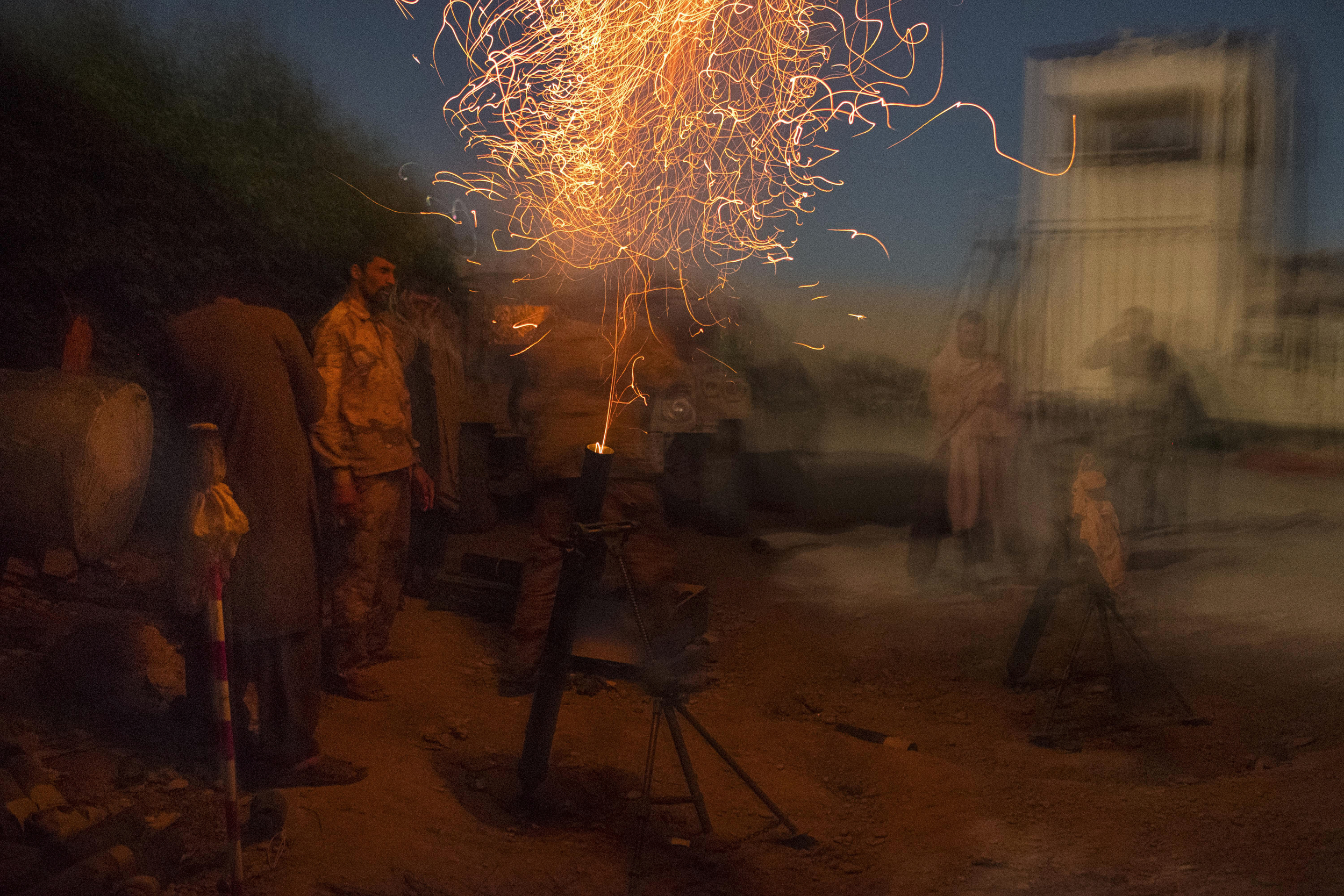  Afghan Border Police fire mortars at Taliban positions in Babaji. Helmand Province, April, 2016. 