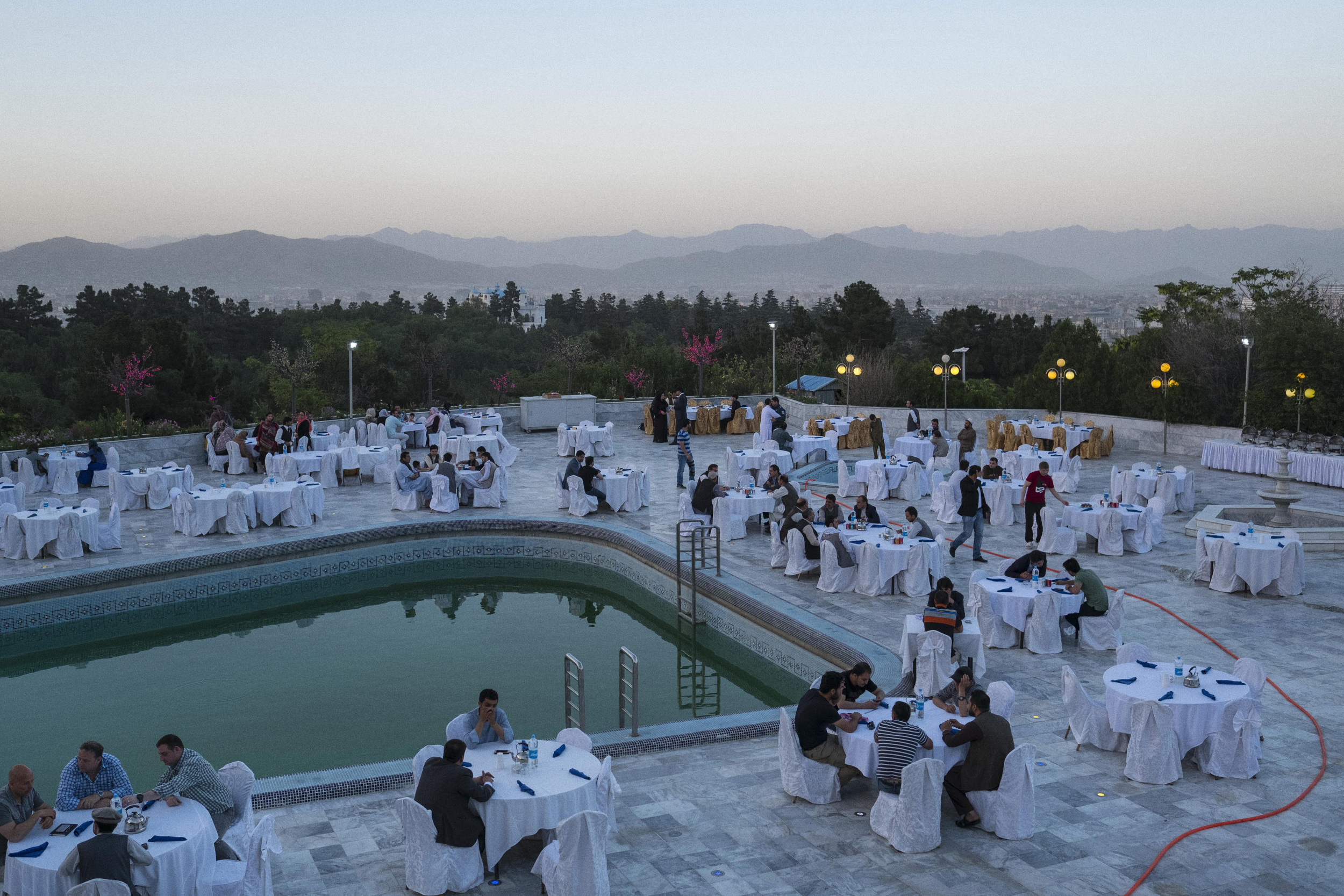  More affluent Kabulis break their Ramadan fast, or Iftar, at the Kabul Intercontinental Hotel. Kabul, June, 2016. 