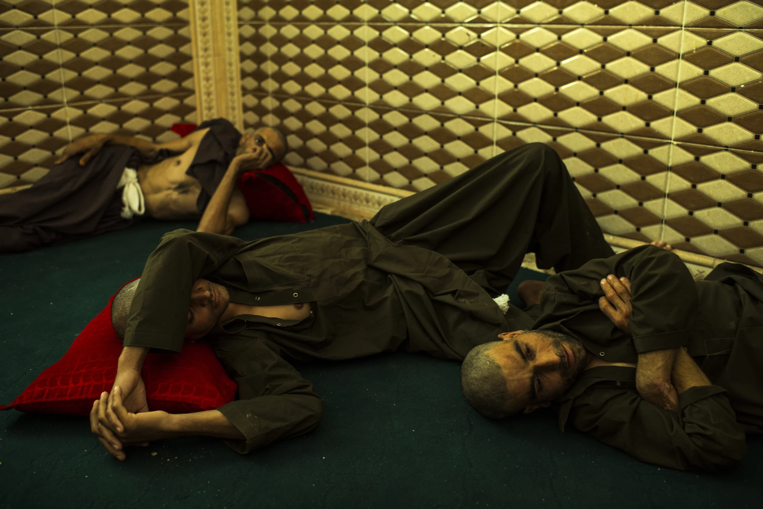  Recently admitted patients in a detoxification room at the 500-bed Sardiq Nazari Shelter for drug addicts in Zaranj, in Afghanistan's southwest. A doctor at the shelter said approximately 70% of his patients are returnees from Iran, where many Afgha