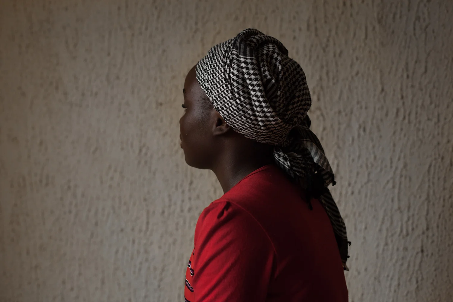 Martha, !4 years On the 7th of Spetember 2014 while I was traveling to a wedding I was captured by Boko Haram. They killed my brother in law and my sisters fiancé. They carried me and my two sisters to their camp in Gulak. I stayed there for four months. I suffered greatly during this time, sometimes there was not enough food and I hardly bathed. They told me not to walk around outside, and when I did they would beat me, they told me not to talk, and I would talk, so they would beat me, they told me not to sing, I would sing and they would beat me. They taught me how to use a gun, and I went on two operations with them where I would carry ammunition’s, but I could never bring myself to kill anyone. I met some of the Chibok girls, and they had been taught to kill people. They tried to force my sister to kill an old man, when she refused they shot her instead, I watched people being slaughtered like ants .They were planning to marry me to one man. A week before the wedding I escaped. I had tried to escape four times but failed every time. An old woman in the camp who spoke my tribal language explained directions of how to escape through the bush. So that night while pretending to go to the toilet, and sneaked away in the night with another girl. I still think about the experience all the time, when I sing in my tribal language I forget, but if I sit quietly I remember everything and will just cry.