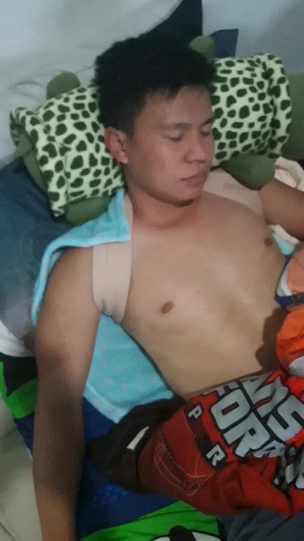 Phon, Tasanee's son, who broke his shoulder playing soccer