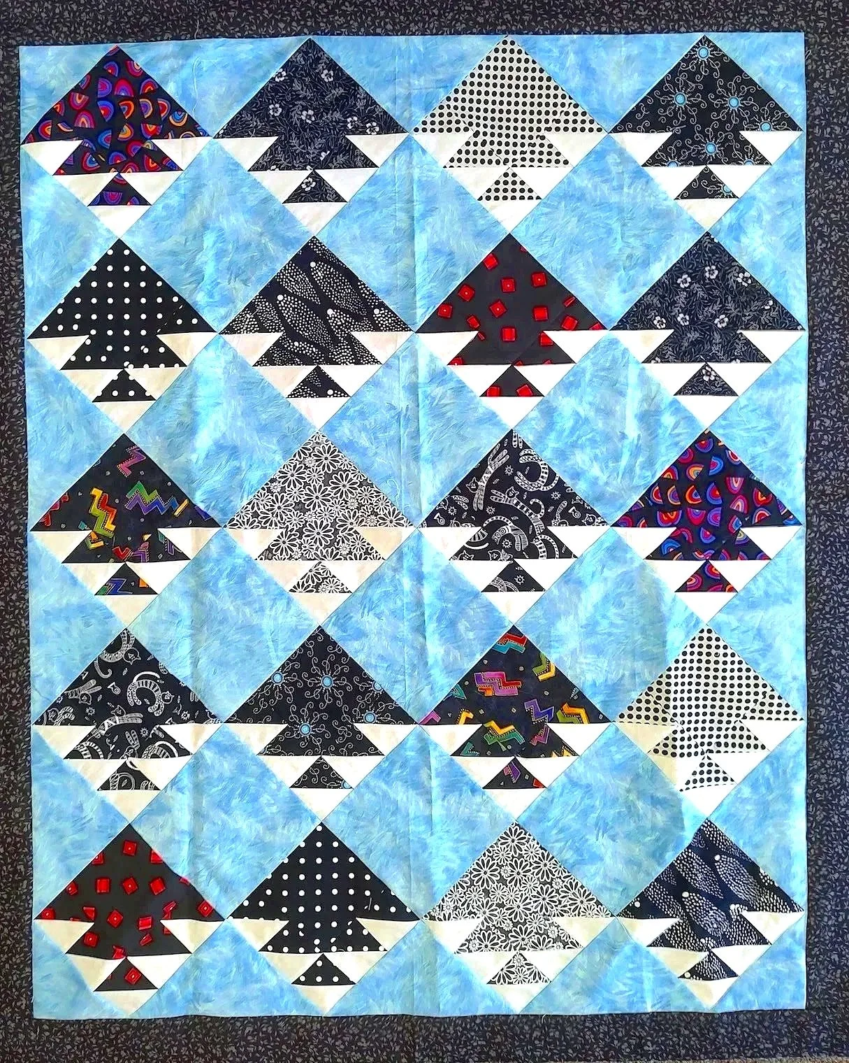 Black and White Triangles on Blue