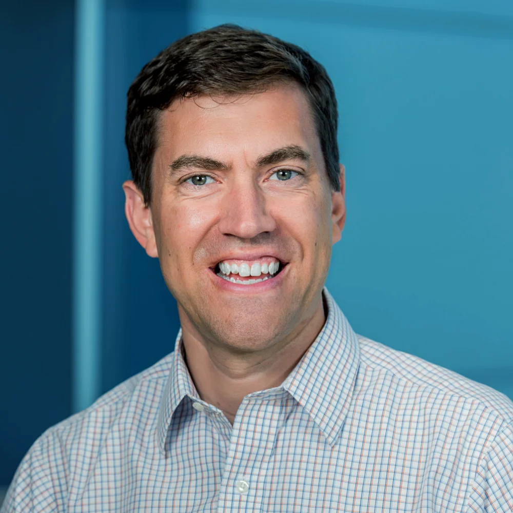 TYLER CHRISTENSON Managing Director