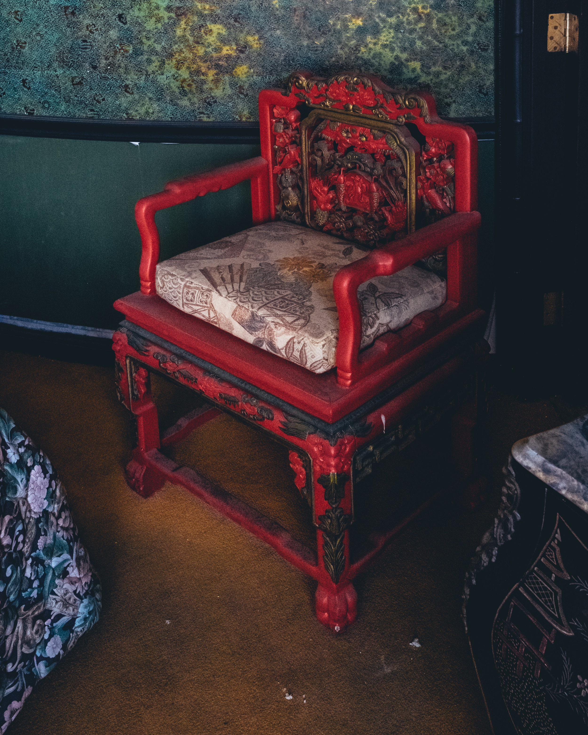 This chair’s pop of red in an otherwise cool toned room is something I’m going to do in my next apartment.