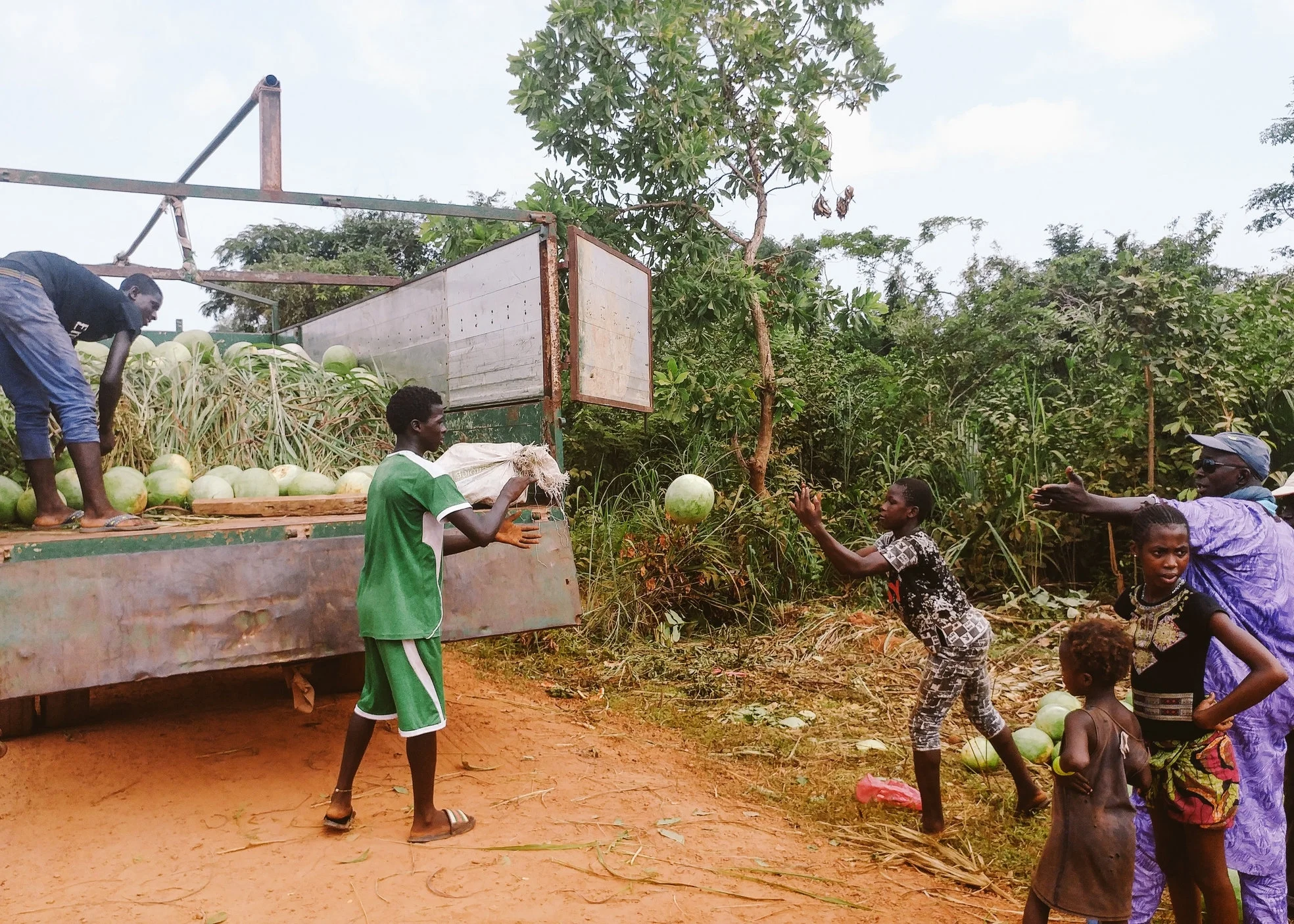 Melons loaded onto a truck parked on one of the new roads