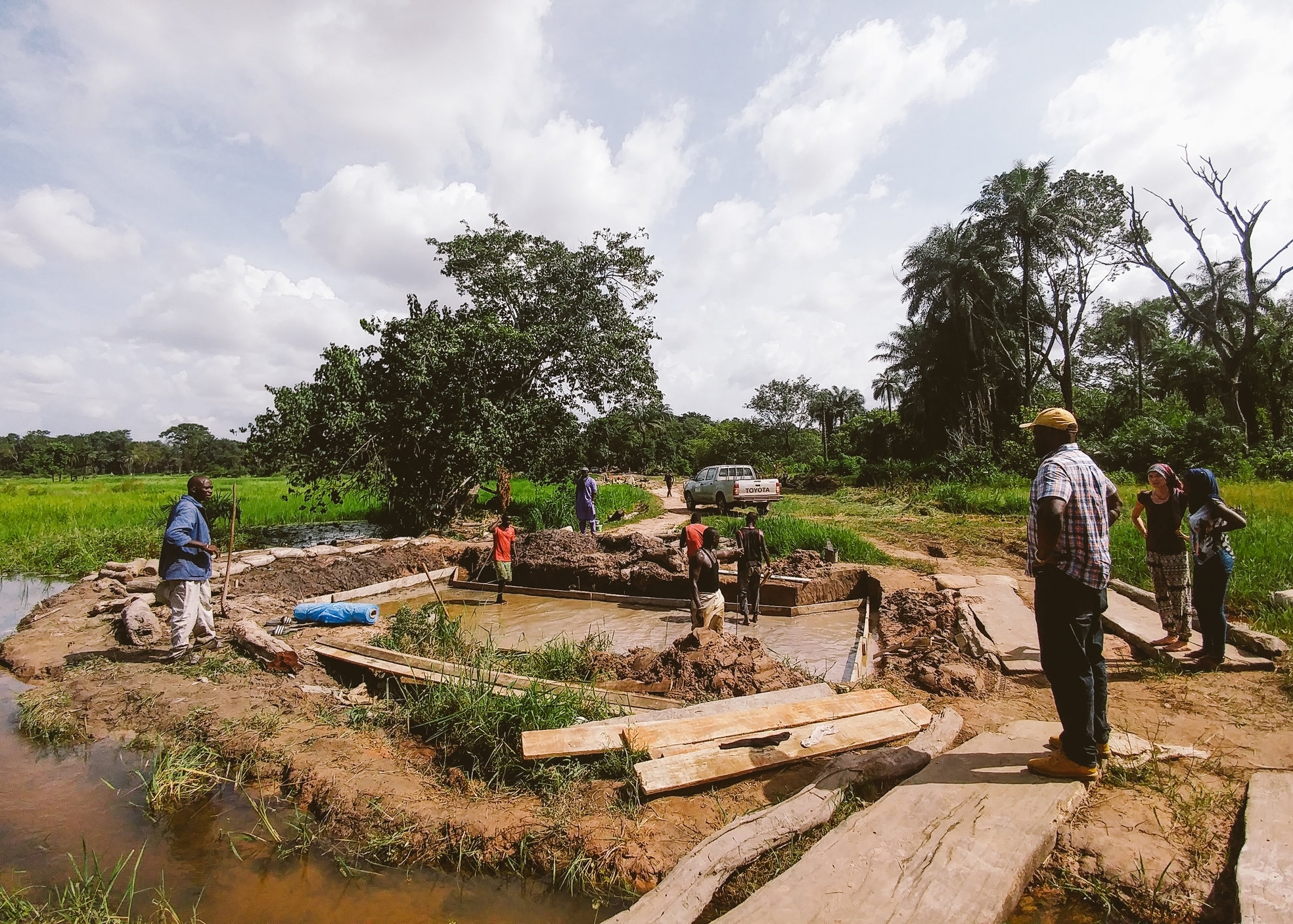  Local laborers prepare to build a box culvert that will accommodate motor vehicle traffic year-round 