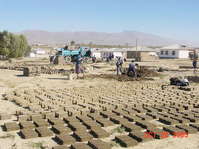  Preparing the bricks for the transitional shelters 