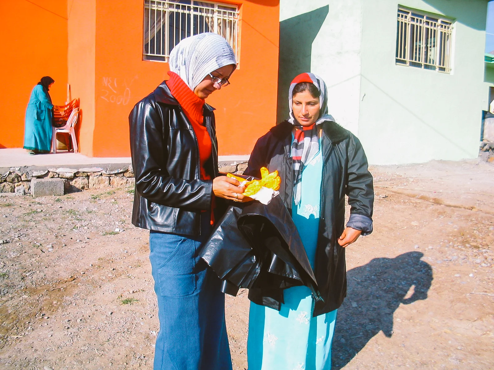 Handing out garbage bags to short-term staff