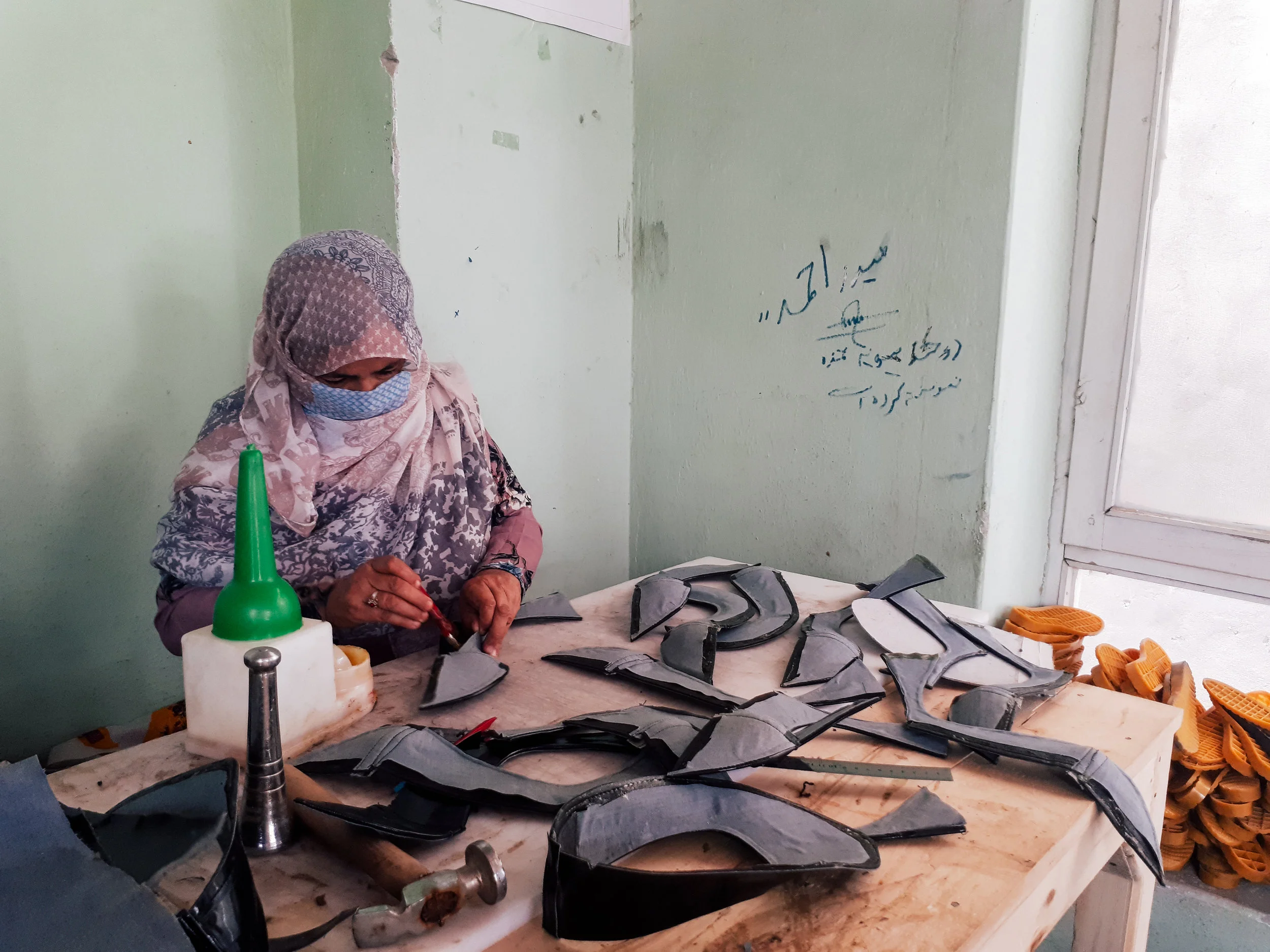 One of our shoe making trainees in class