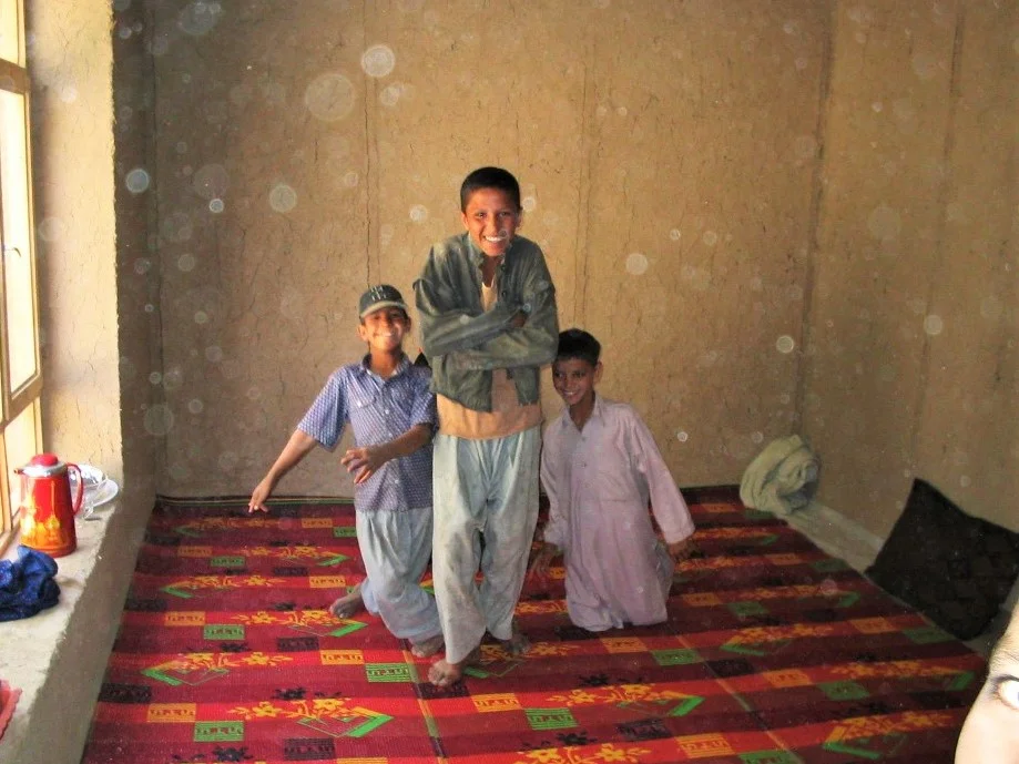 One of Mari’s sons and his cousins enjoying the new shelter