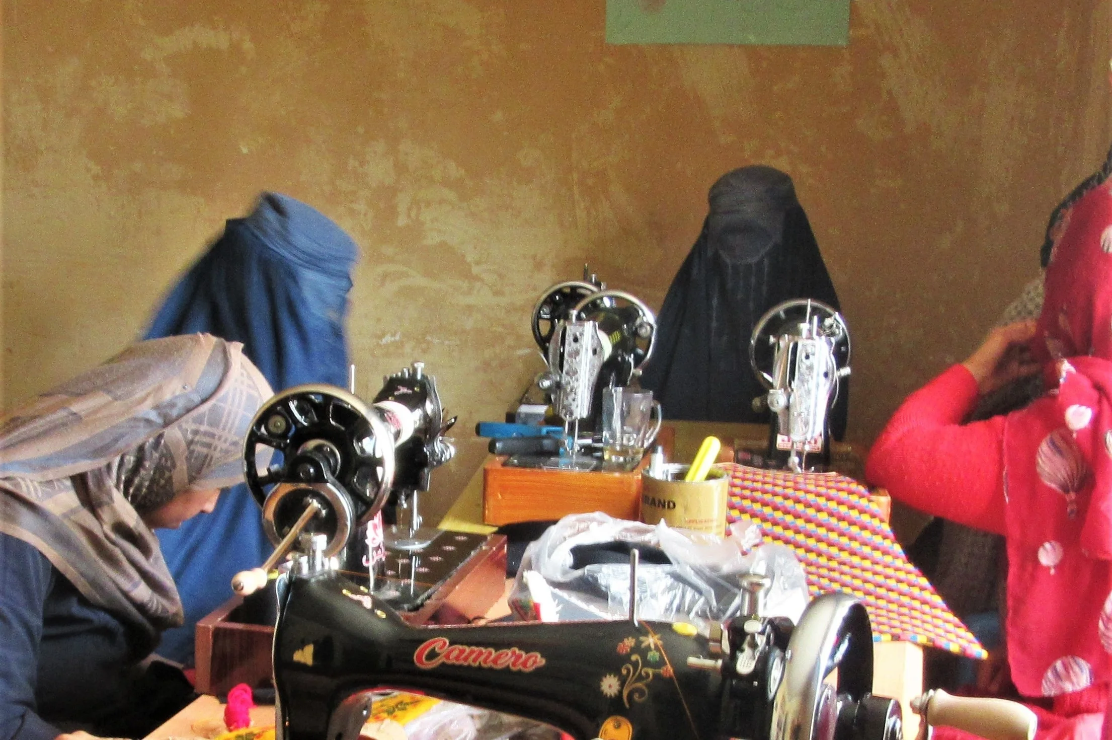 Women’s group working on their handbags