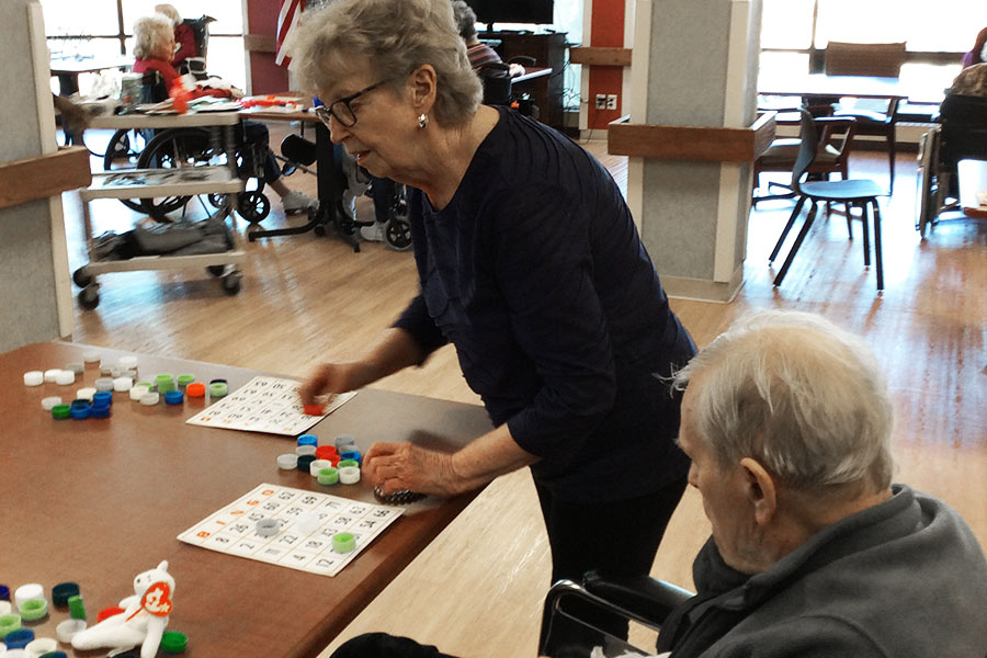 Helping with Bingo at the local nursing homes. 