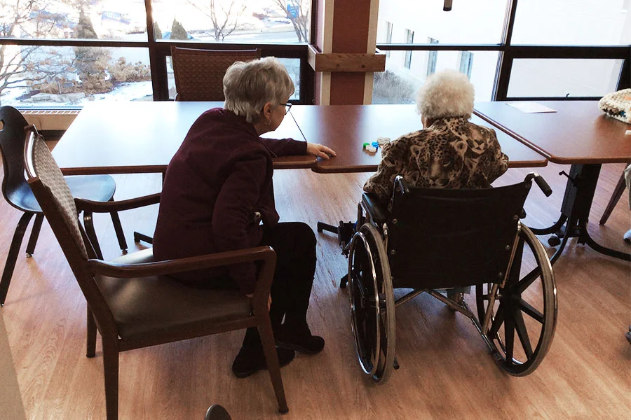 Helping with Bingo at the local nursing homes.