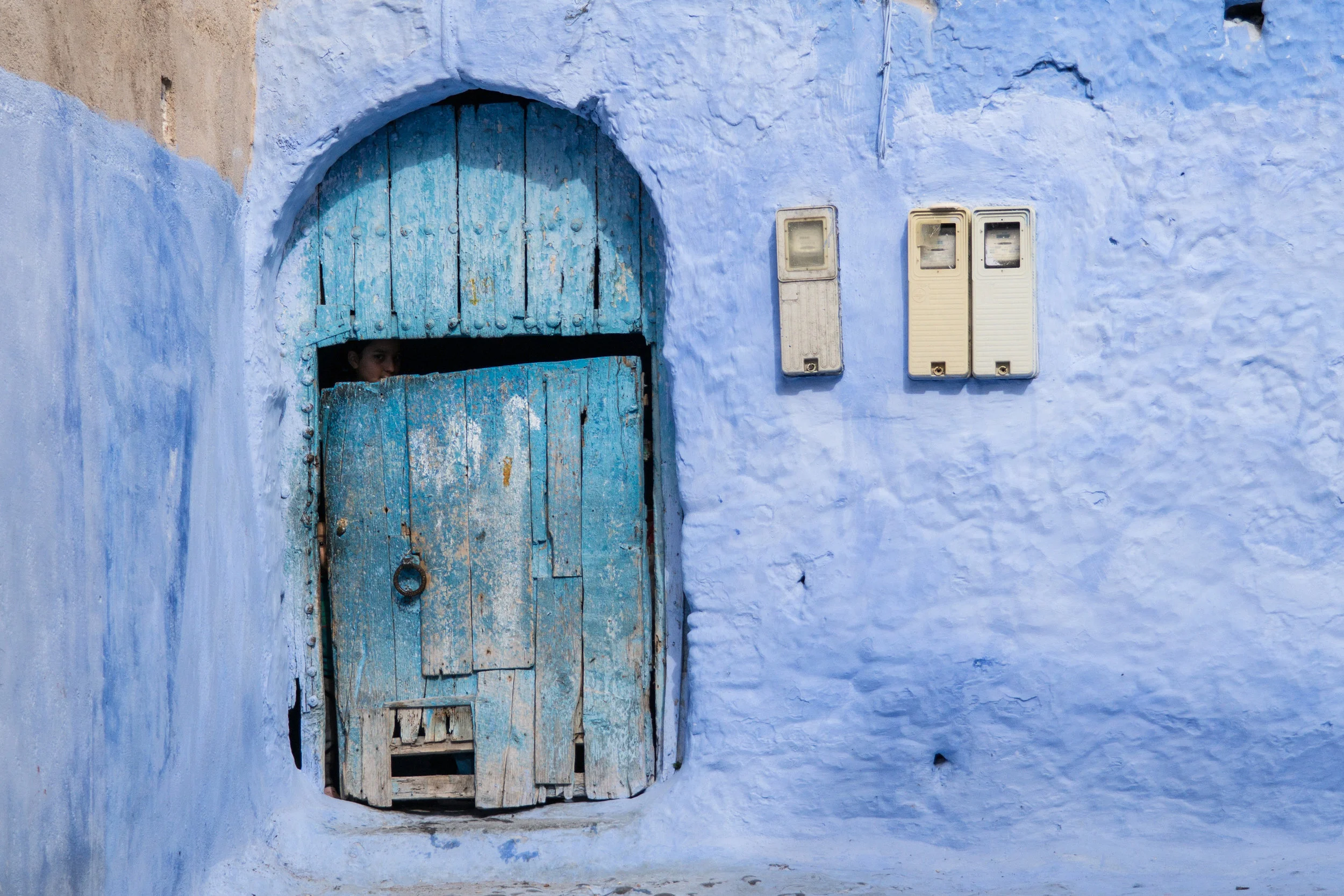 Eyes through Crack in Door  - Chefchaouen.jpg