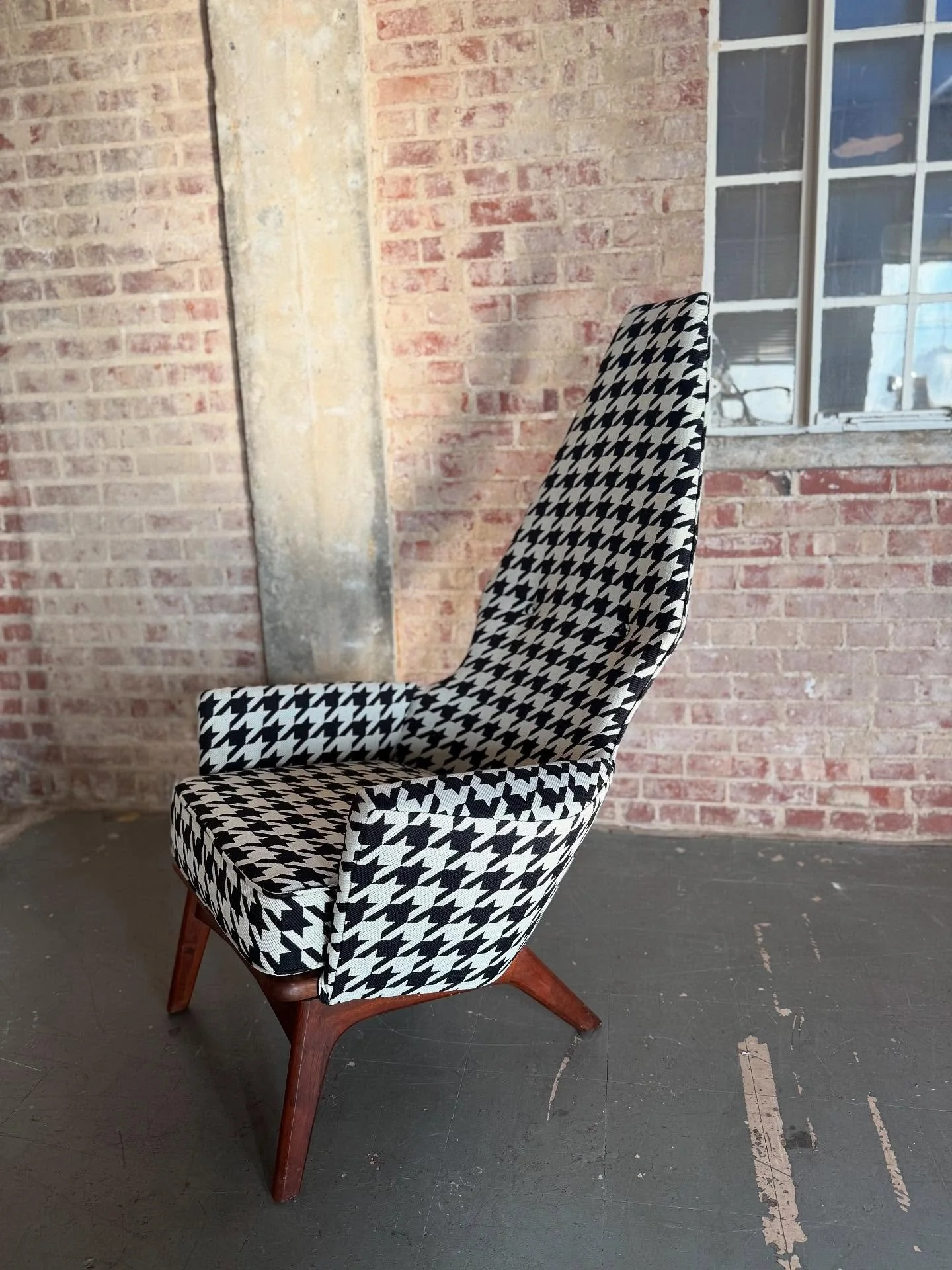 This chair was super fun to work on but a real puzzle to make happen. The project came to me completely naked and fresh from a rebuild job. The carpenter fiberglassed the arms onto the chair making it impossible to reupholster the way it was original